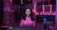 Celebrity gif. Streamer and musician Bella Poarch says "Oh nice!" then excitedly claps her hands.