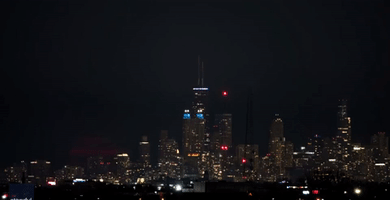 'Bold Red' Moon Rises Above Chicago Skyline