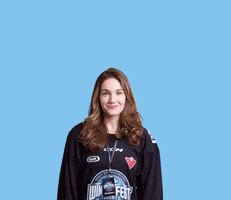 Sports gif. Lindsay Hamilton, a SportsCentre anchor, wears a Toronto Winterfest jersey and she smiles and spreads her hands out as she says, "Good morning," which appears as text.