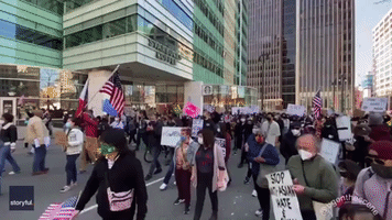Demonstrators March in Downtown Detroit for 'Stop Asian Hate' Rally