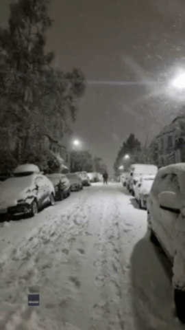 Man Skies Down London Street as Cold Weather Grips UK