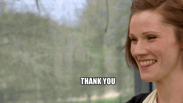 Reality TV gif. Cathryn Dresser on Great British Baking Show smiles wide and says "thank you, thank you," which appears as text.