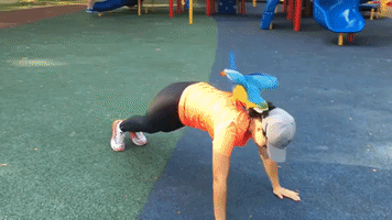 Mummy and Macaw Exercise in Public Together