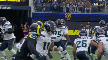 kingkaps7 giphyupload kingkaps7 seahawks a glass of your best zachcharbon showing off the hands GIF