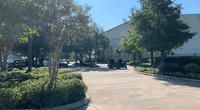 Motorcade Carrying George Floyd's Casket Arrives at Houston Funeral Home
