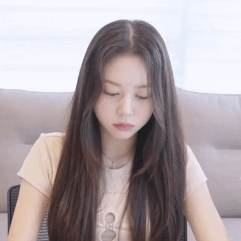 K-Pop Smirk GIF