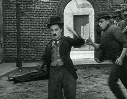 charlie chaplin dodging those punches GIF by Maudit