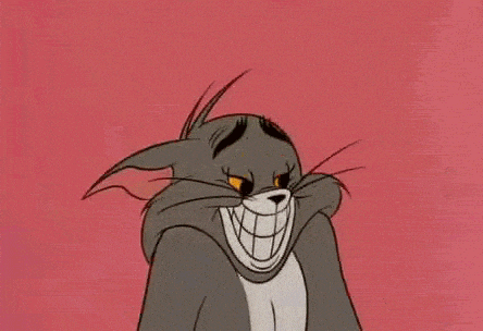 Tom from Tom & Jerry putting his hands up in a way that suggests he has no idea what he's doing. 
