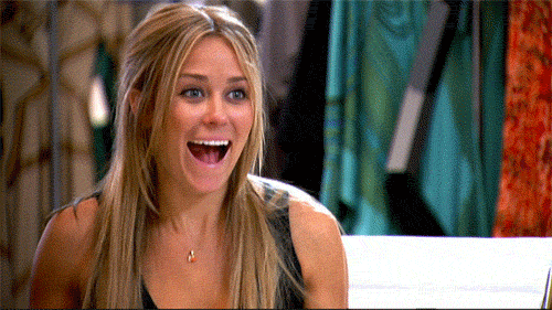 Reality TV gif. Whitney Port and Lauren Conrad from The Hills flap their hands and scream excitedly at each other.
