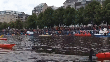 Climate Change Protesters Paddle Through Hamburg Ahead of G20 Summit