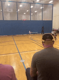 Adorable Boy Travels Up and Down Basketball Court, Determined to Make Shot