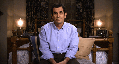 TV gif. Ty Burrell as Phil in Modern Family shrugs and holds both of his hands up as if to say, “I don’t know.”