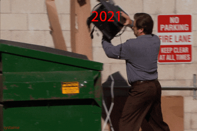 TV gif. Nick Offerman as Ron Swanson in Parks and Recreation tosses a computer with the year twenty twenty-one in red text on it into a green dumpster with disdain. 
