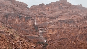 Waterfalls Form as Heavy Rain Runs off Rocks in Southwest Utah