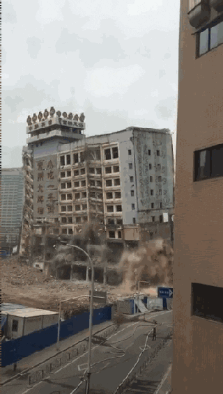 china building demolition GIF by Mashable