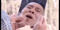 scared mirror GIF