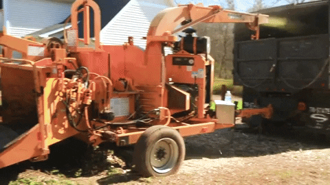 JCPropertyProfessionals giphygifmaker jc property professionals tree service wood chipper GIF