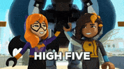 Cartoon gif. Batgirl and Bumblebee in Lego DC Superhero Girls smile and high give, then walk towards us with a robot following behind them. Text, "High five."