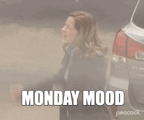 The Office gif. Jenna Fischer as Pam stands in a parking lot and throws down her fists as she screams into the air. Text, "Monday Mood."