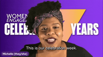 Video gif. Michelle, a black person who uses they/she pronouns, looks at us with an earnest smile and says, “This is our celebration week.” The background text reads, “Women engaged Celebrate year.”