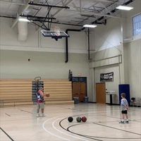 Young Baller Learns Some Trick Shots