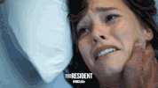 the resident hug GIF