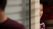 Neighbours happy cheeky sneaky spying GIF