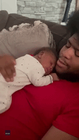 Newborn Girl Delights Dad With Surprise Kiss