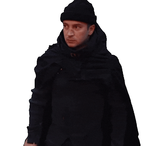 Sticker gif. Music video for Overcompensate by Twenty One Pilots. Man wearing a red ninja outfit covers his mouth with both gloved hands.