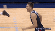 GonzagaBulldogs smile celebration basketball high five GIF