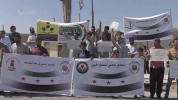 Khan Shaykhun Residents Demonstrate Following UN Confirmation of Sarin Gas Attack in April