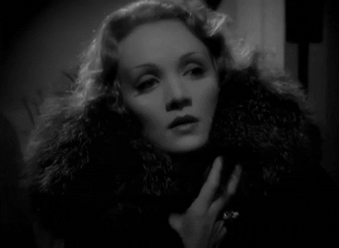 furglamor giphyupload loop side eye marlene dietrich GIF