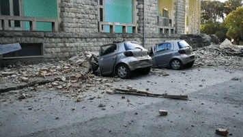 Cars Destroyed by Falling Debris as Earthquake Rocks Albania