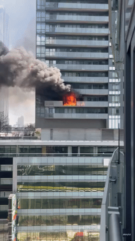 Flames Engulf Apartment in High-Rise Building in Downtown Toronto