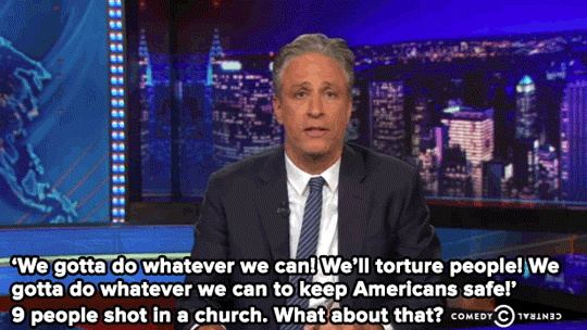 shooting jon stewart GIF