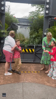 Lifelike Raptor Makes Kid Leap in Fright During Family Photo at Universal Orlando