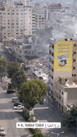 Ruins of Gaza Tower Seen Amid Israeli Airstrikes