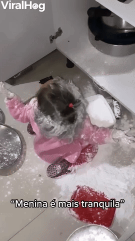Little Girl Makes a Mess with Flour
