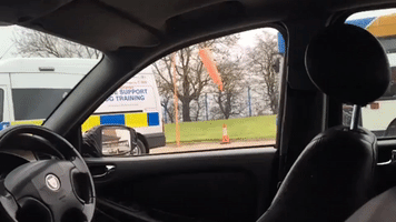 Police Dog's Spectacular Entrance Into a Suspicious Car