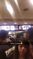 Chaos at KFC as Customers Jump Counter to Steal Chicken