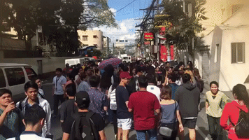 Buildings in Manila Evacuated After Earthquakes Hit Nearby Batangas Province