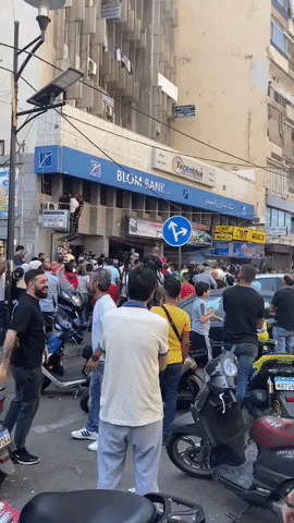 People Gather Outside Lebanese Bank as Depositor Demands Access to Savings