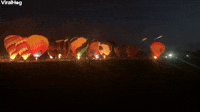 Hot Air Balloons Light up the Night Sky