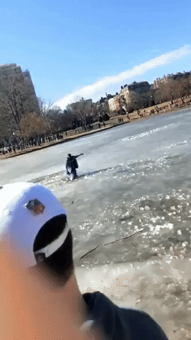 Jubilant Patriots Fans Test the Ice on Boston Public Garden Lake
