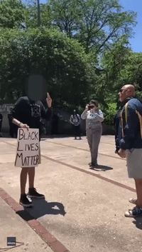 Retired Judge Throws Punch at Chicago Anti-Racism Protester Near Defaced Columbus Statue