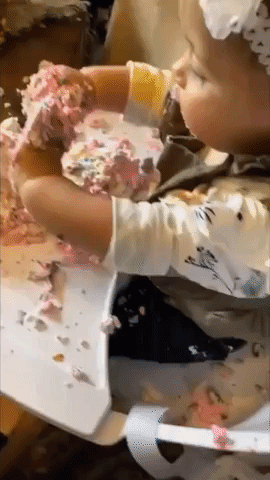 Baby Girl Enjoys Cake on First Birthday in Reno