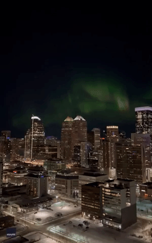 Bright Green Aurora Dazzles Over Calgary Skyline