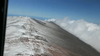 Aerial Footage Shows Snow-Covered Haleakala Peak