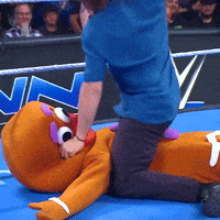 Beat Up Gingerbread Man GIF by WWE
