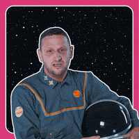 Celebrity gif. Tim Robinson in a gray astronaut suit with his helmet under his arm against a starry space background. He points his finger and looks intently while saying “if you do school people say it’s great.” Bold text reads, "School is cool!"
